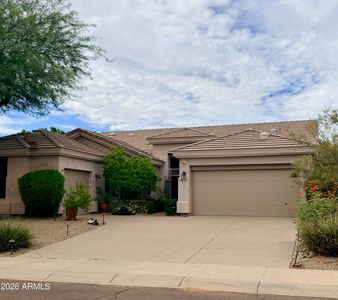 7228 E WHISTLING WIND Way