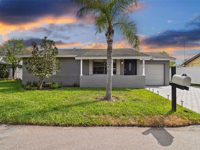 7607 WOODLAND OAKS COURT