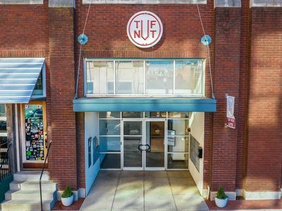 423 E 3rd St APT 209