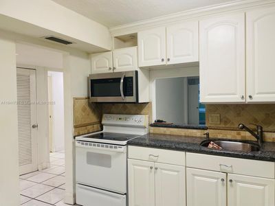 1401 NE 191st St #D111