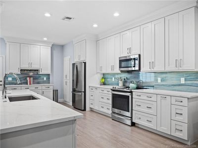 1570 SE Sheffield Ter APT 102