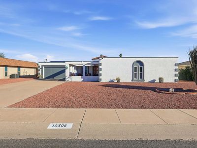 10308 W Sutters Gold Ln