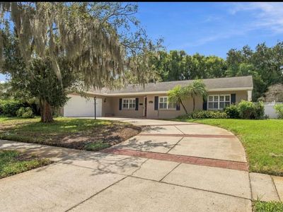 11626 CARROLLWOOD DRIVE