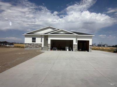 Property at 102 N Stocktrail Dr, Rigby, ID