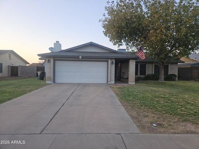 7114 W SUNNYSLOPE Lane