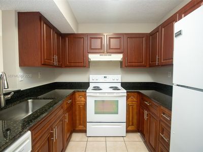 9491 Palm Cir S APT 101