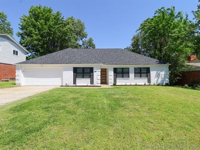 7037 E 58th Pl