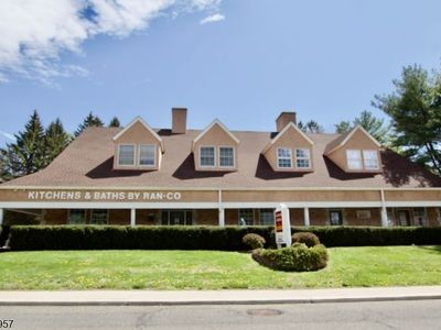 56 E Main St #1
