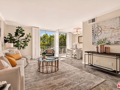 100 S Doheny Dr APT 402