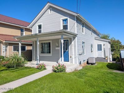 240 W John St