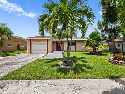 6981 SW 1ST Court