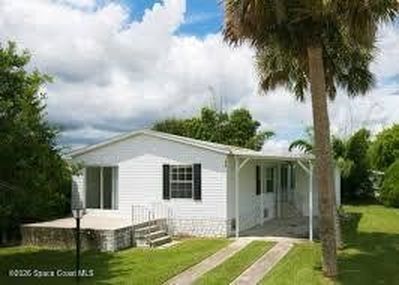 Property at 818 Thrush Cir, Barefoot Bay, FL