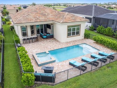 9247 SW Miracoli Way