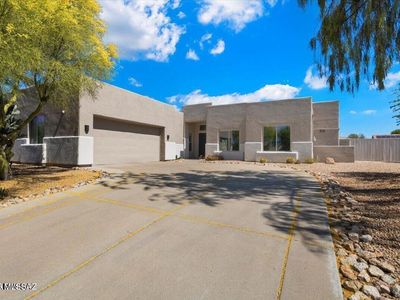 11318 E White Feather Ln