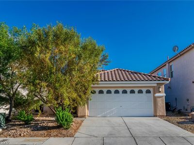 6309 Climbing Vine Ave