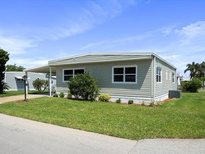 309 NE Pinelake Village Boulevard