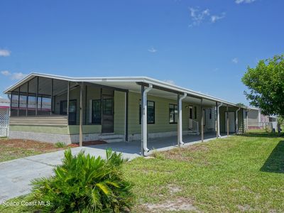 Property at 434 Royal Tern Dr, Barefoot Bay, FL